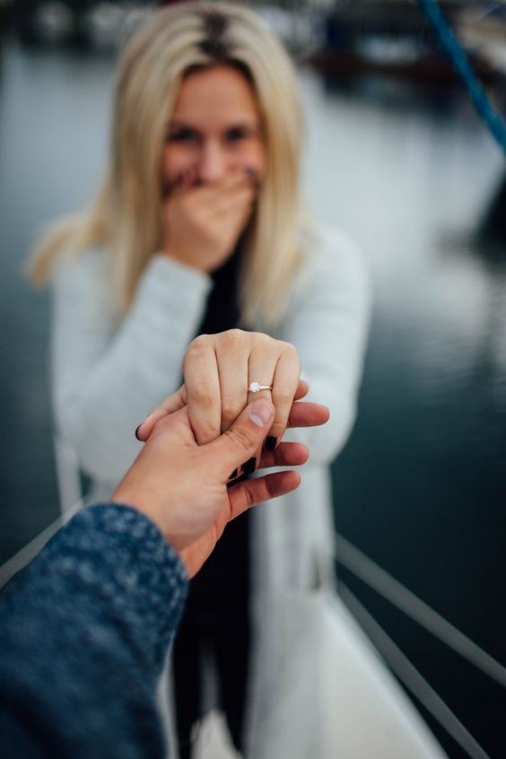 This is a classic! You can never go wrong with something like this! Source: http://howheasked.com/julie-and-rus-sweet-sailboat-proposal/
